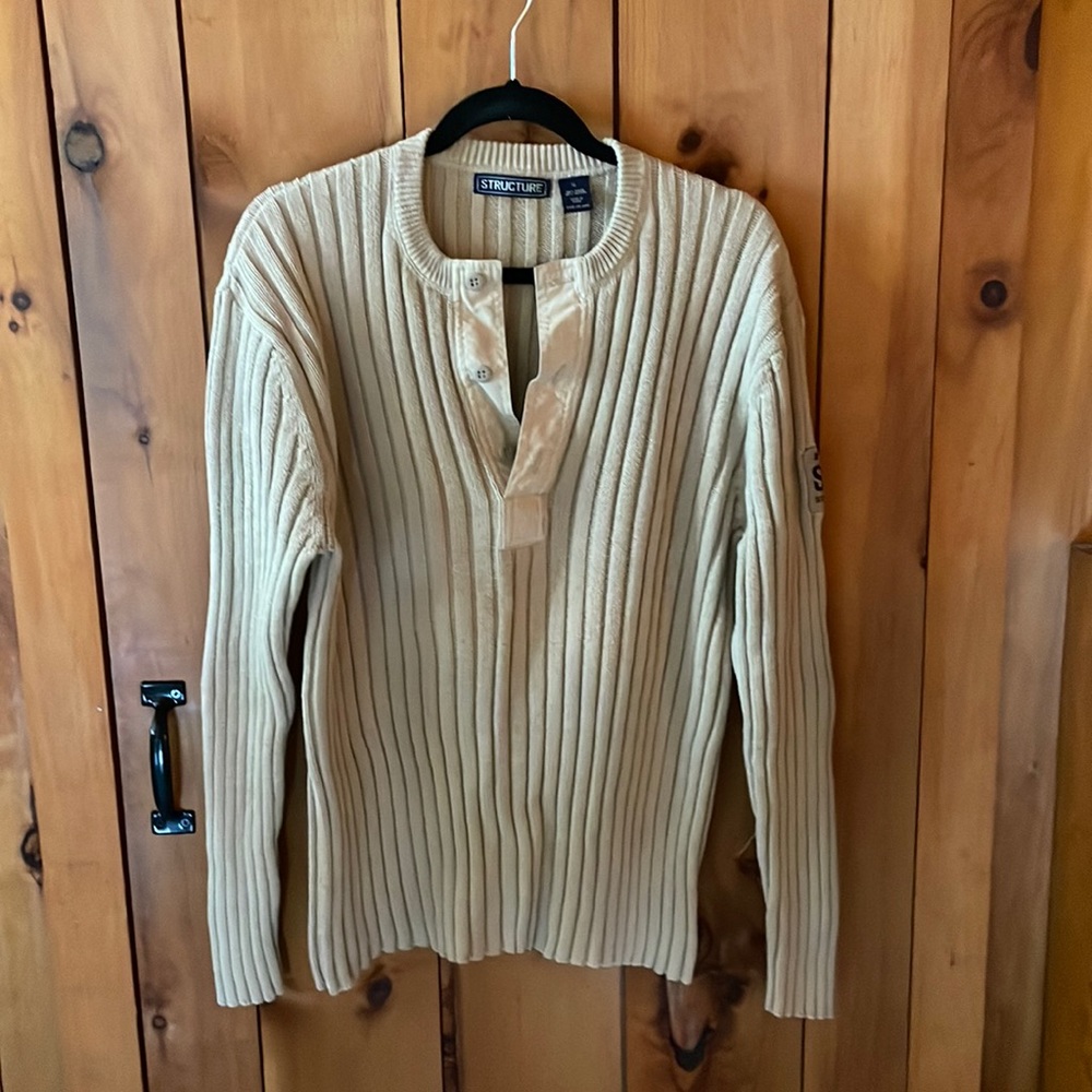 Men’s cable pullover sweater with button opening neck